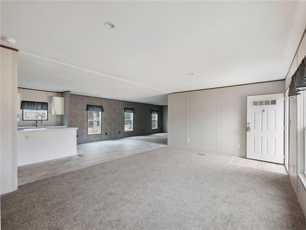 5226 Bogus Road Commerce, GA 30530 - Photo 4 of 41 a view of a big room with closet and windows