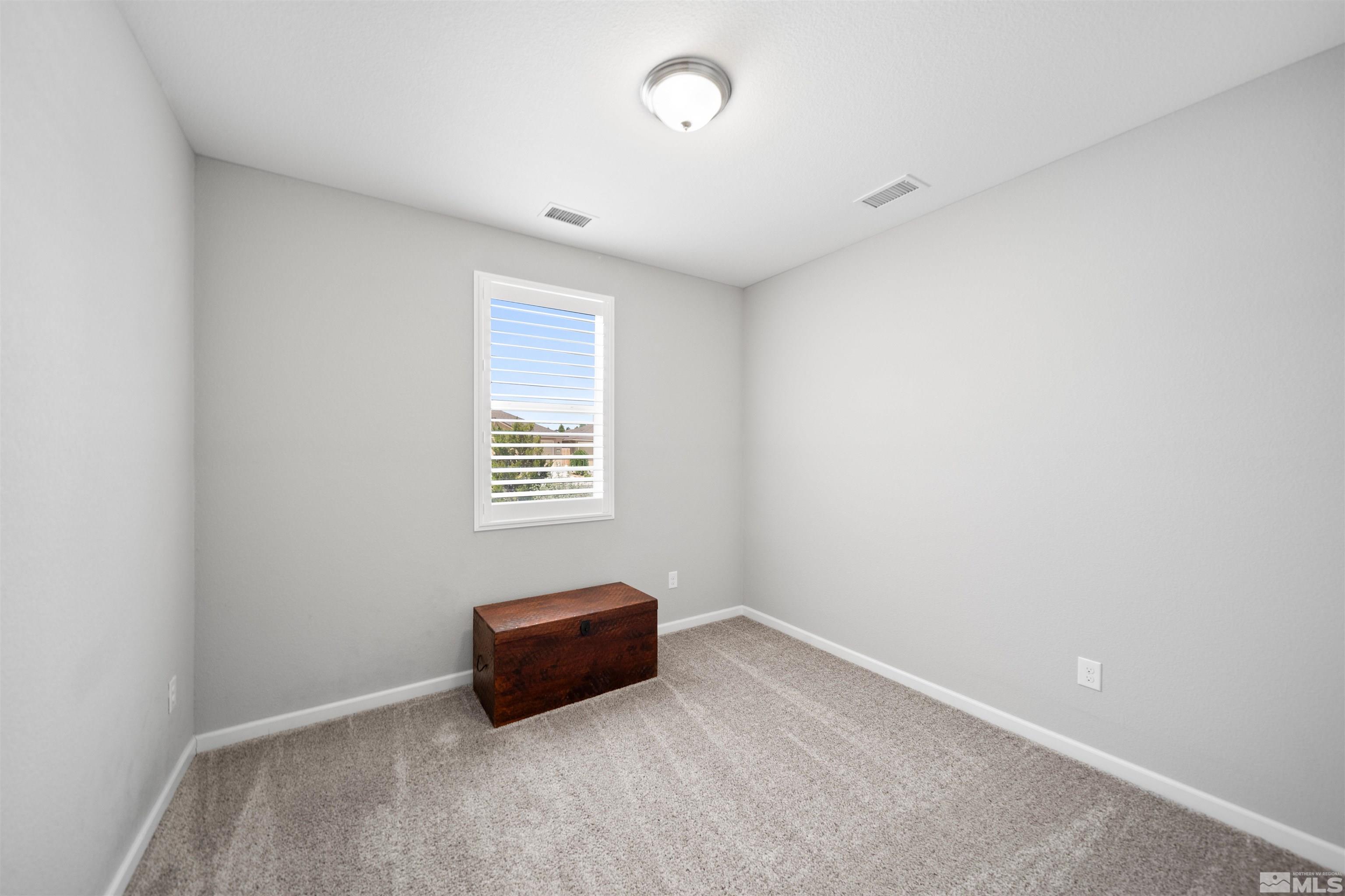 449 Scenic Ridge Drive Reno, NV 89506 - Photo 20 of 22 an empty room with a window