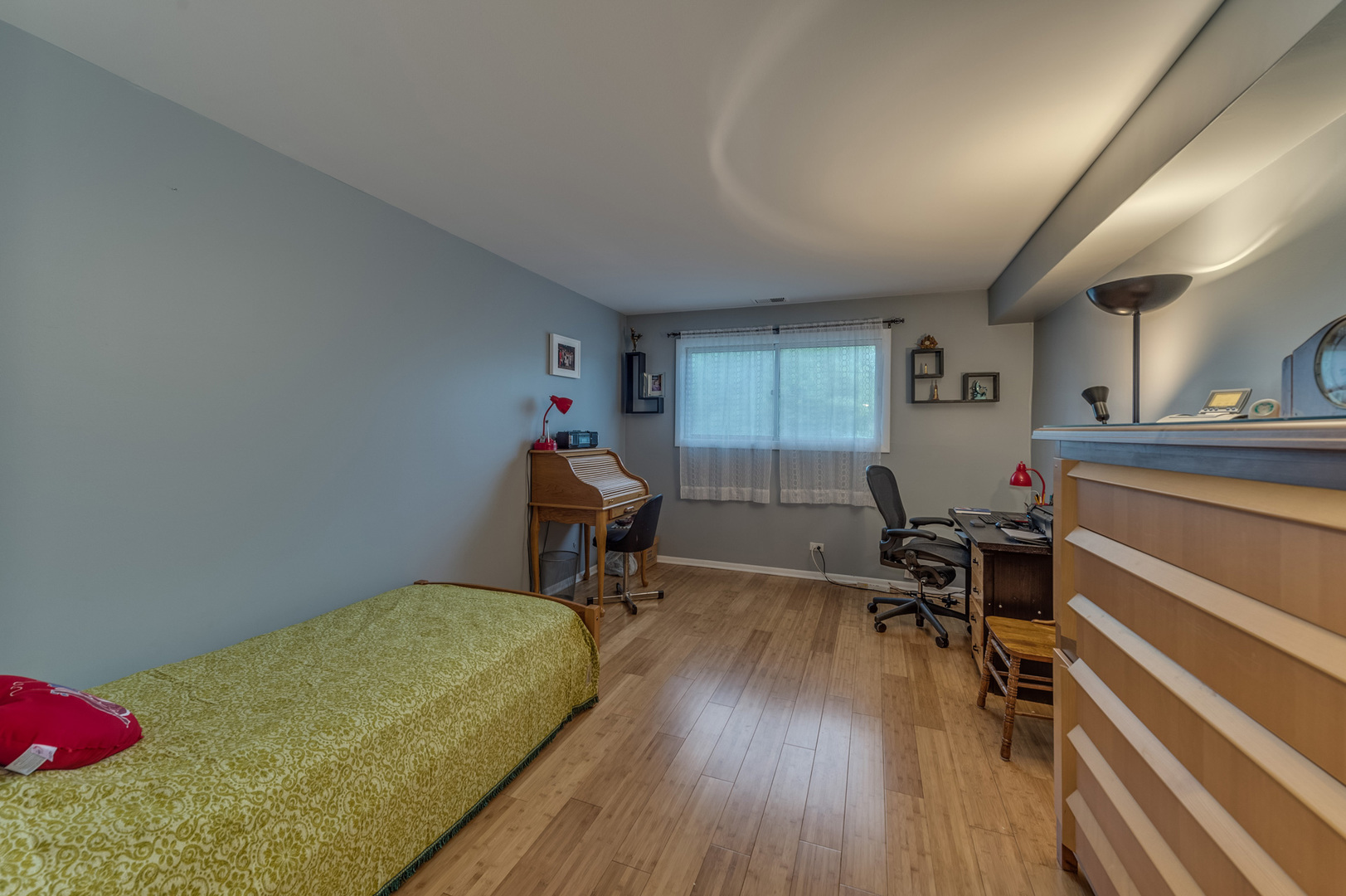 110 Green Bay Road, Unit 101 Glencoe, IL 60022 - Photo 21 of 31 a bedroom with furniture and a wooden floor