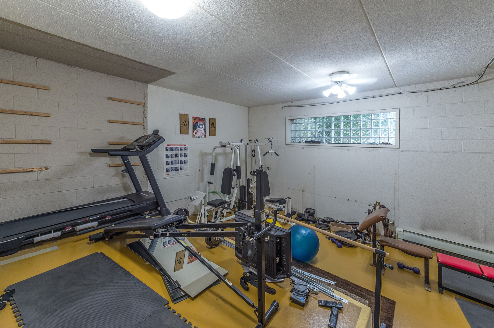 110 Green Bay Road, Unit 101 Glencoe, IL 60022 - Photo 27 of 31 a view of a room with gym equipment