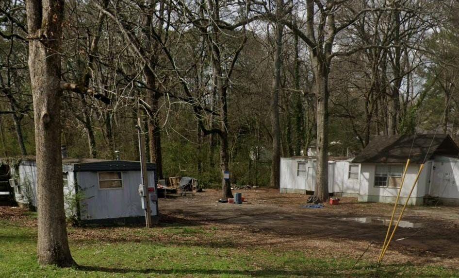 107 Kirton Street Rome, GA 30165 - Photo 1 of 1 a view of a park with large trees