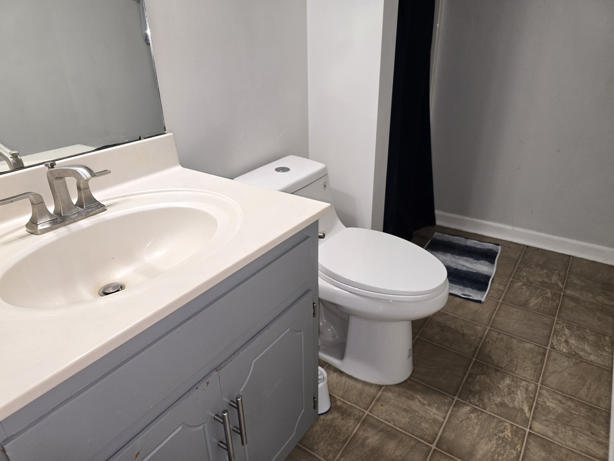 1905 Timberline Circle Oak Grove, KY 42262 - Photo 21 of 33 a bathroom with a sink toilet and a mirror