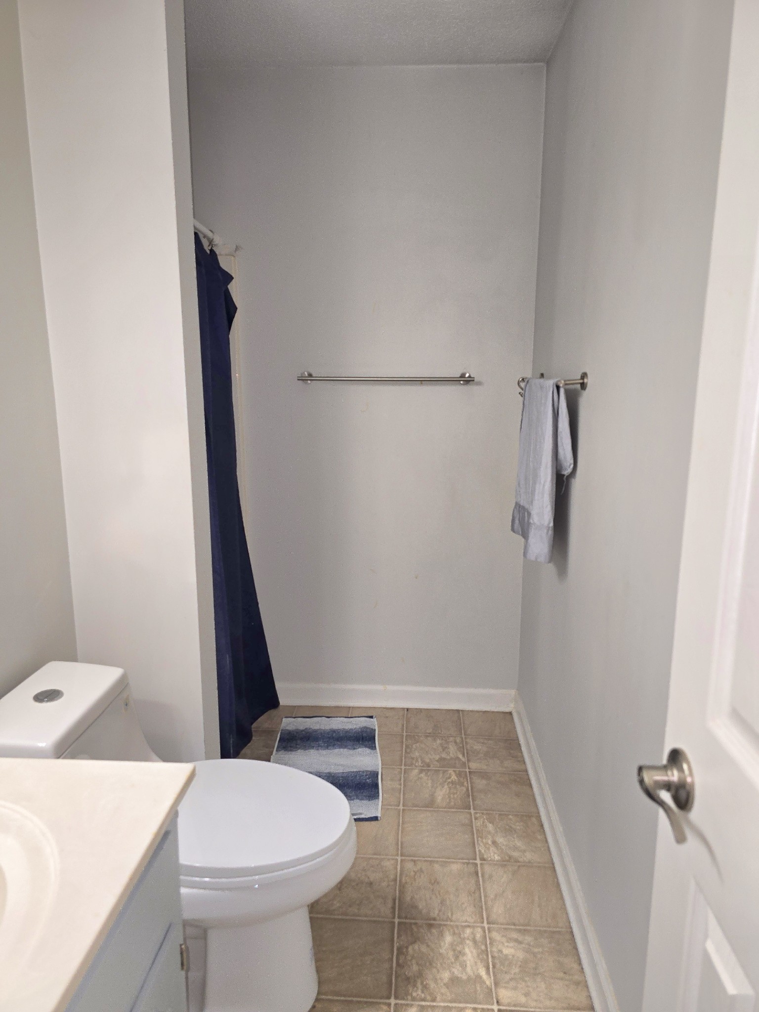 1905 Timberline Circle Oak Grove, KY 42262 - Photo 24 of 33 a bathroom with a sink a toilet a shower and vanity