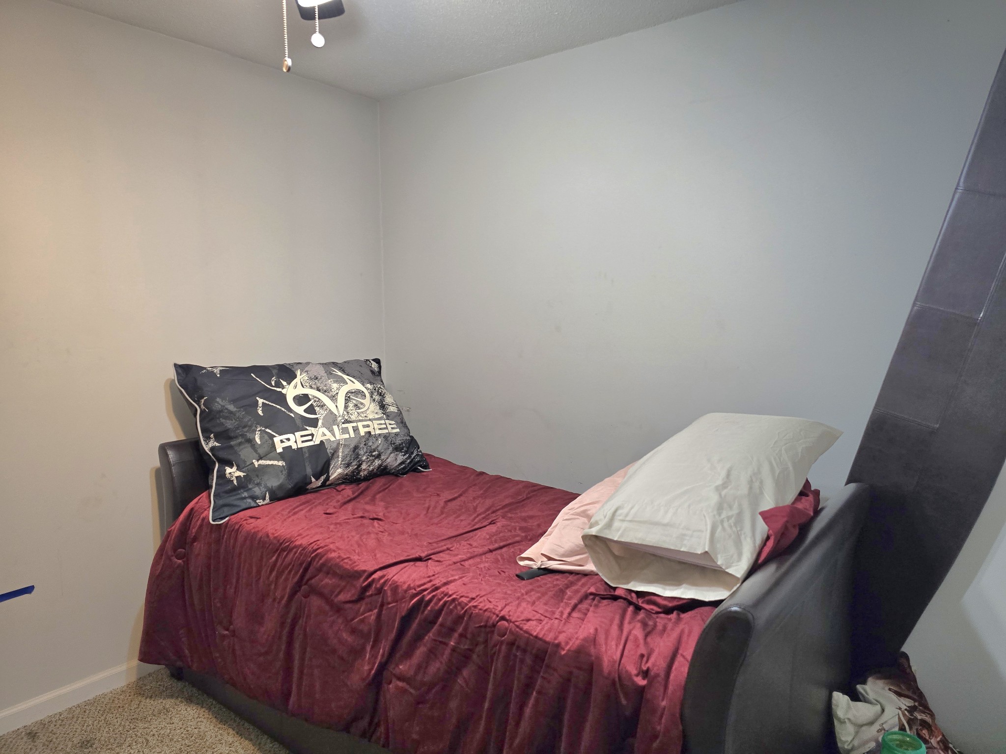 1905 Timberline Circle Oak Grove, KY 42262 - Photo 25 of 33 a bed sitting in a bedroom next to a window