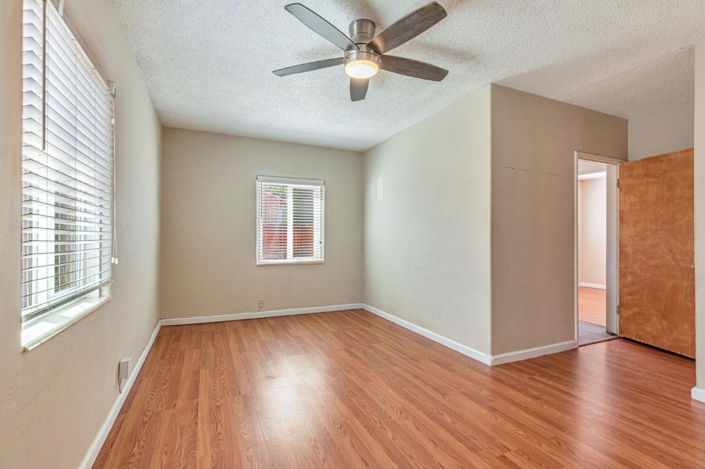 2718 Ferguson Road Gilroy, CA 95020 - Photo 36 of 94 a view of empty room with wooden floor and fan