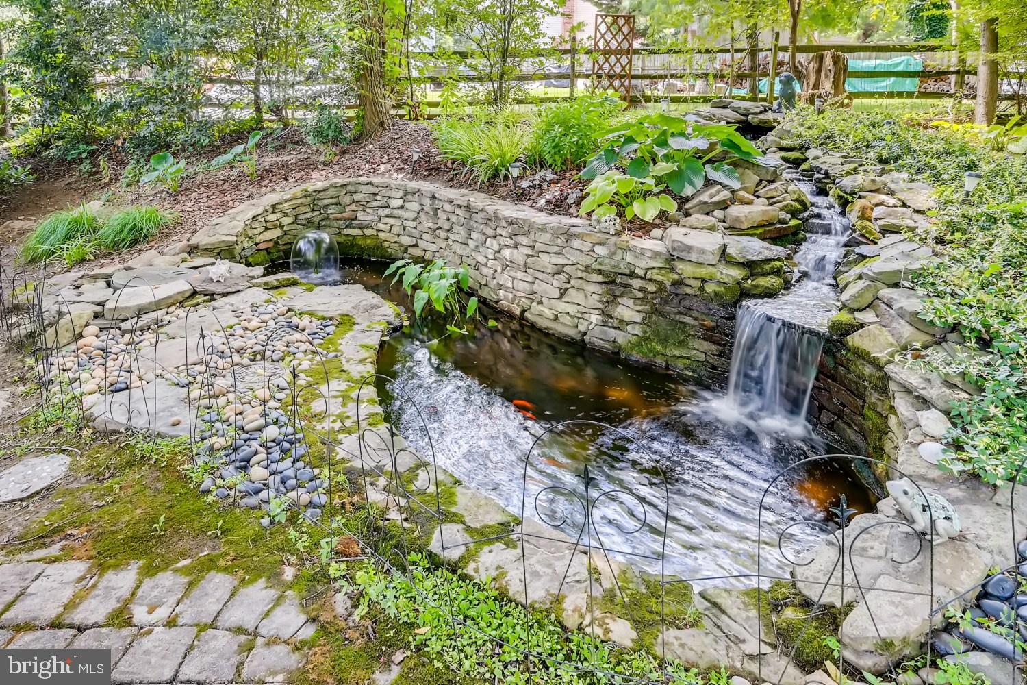 8380 Lark Brown Road Columbia, MD 21045 - Photo 42 of 43 Relax to the sound of the waterfall in your yard