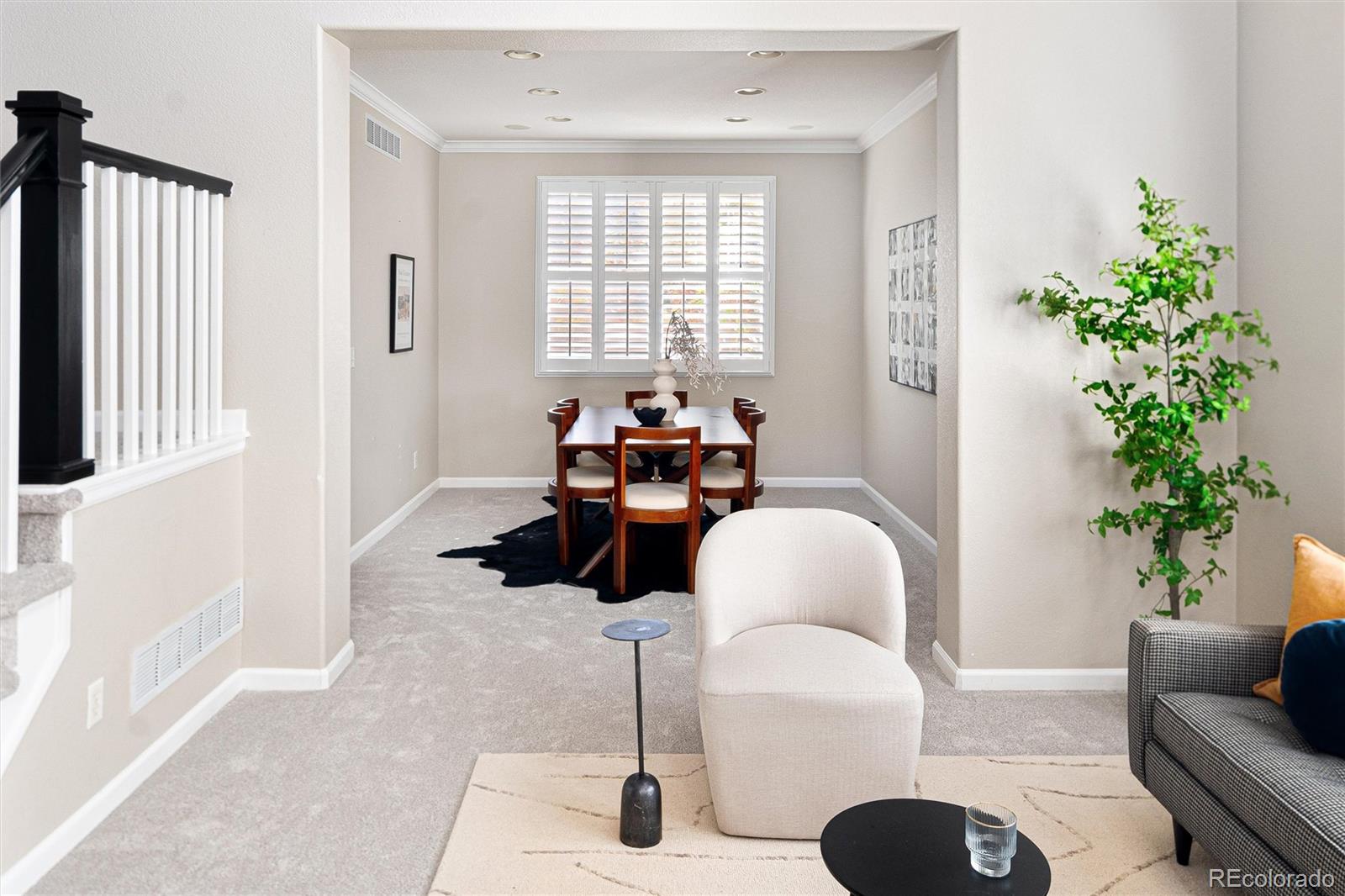 2836 Rockbridge Circle Highlands Ranch, CO 80129 - Photo 11 of 50 a living room with furniture and a large window