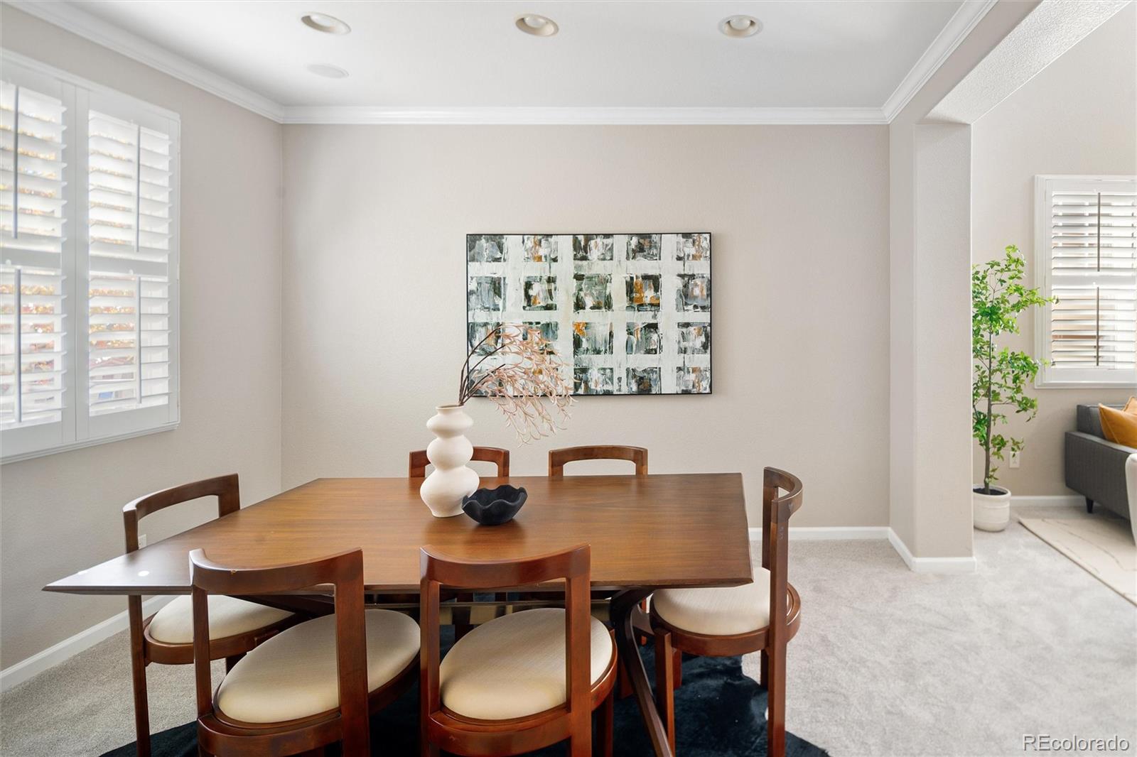 2836 Rockbridge Circle Highlands Ranch, CO 80129 - Photo 13 of 50 a view of a dining room with furniture and window