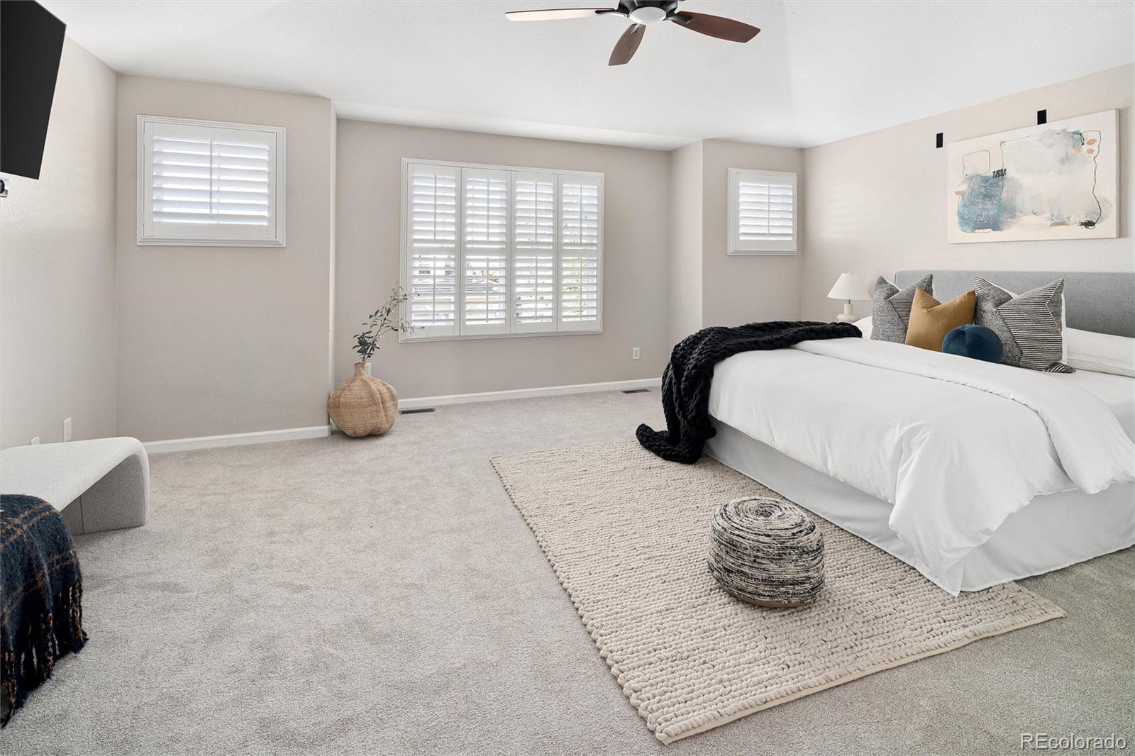 2836 Rockbridge Circle Highlands Ranch, CO 80129 - Photo 30 of 50 a bedroom with furniture and a window