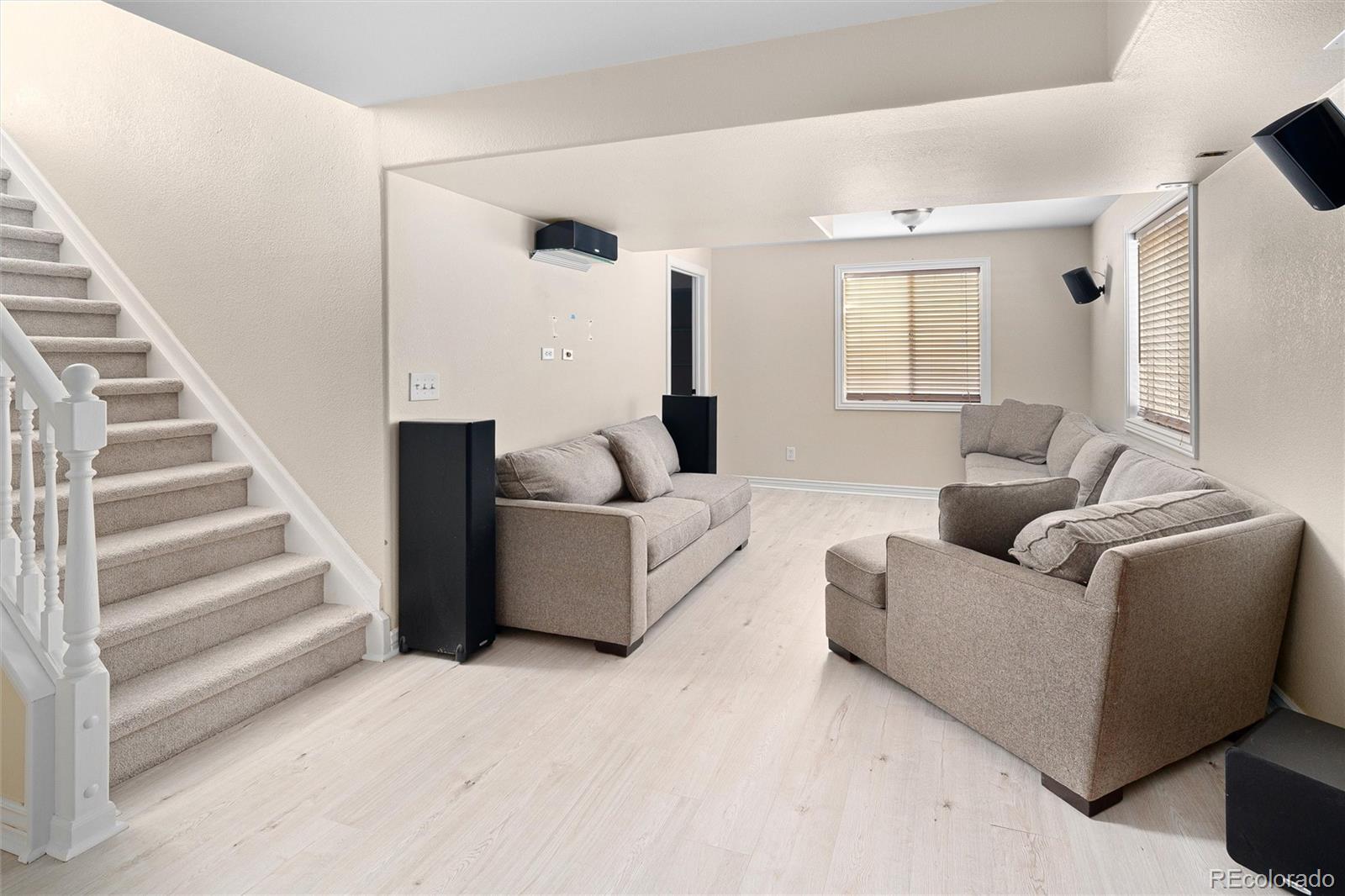 2836 Rockbridge Circle Highlands Ranch, CO 80129 - Photo 39 of 50 a living room with furniture and a large window
