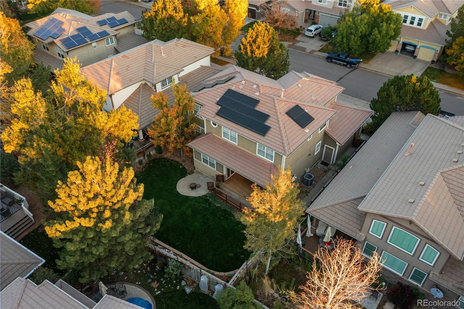 2836 Rockbridge Circle Highlands Ranch, CO 80129 - Photo 4 of 50 an aerial view of a house with a yard