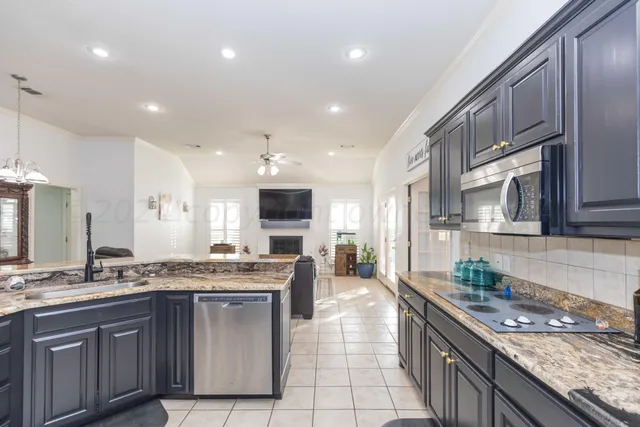 a kitchen with a table and chairs in it