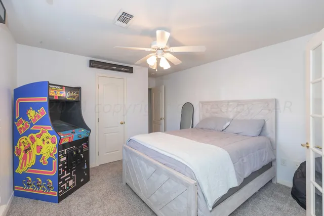 a bathroom with a sink toilet
