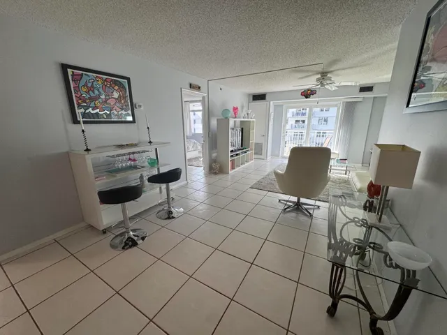 a view of a workspace with furniture