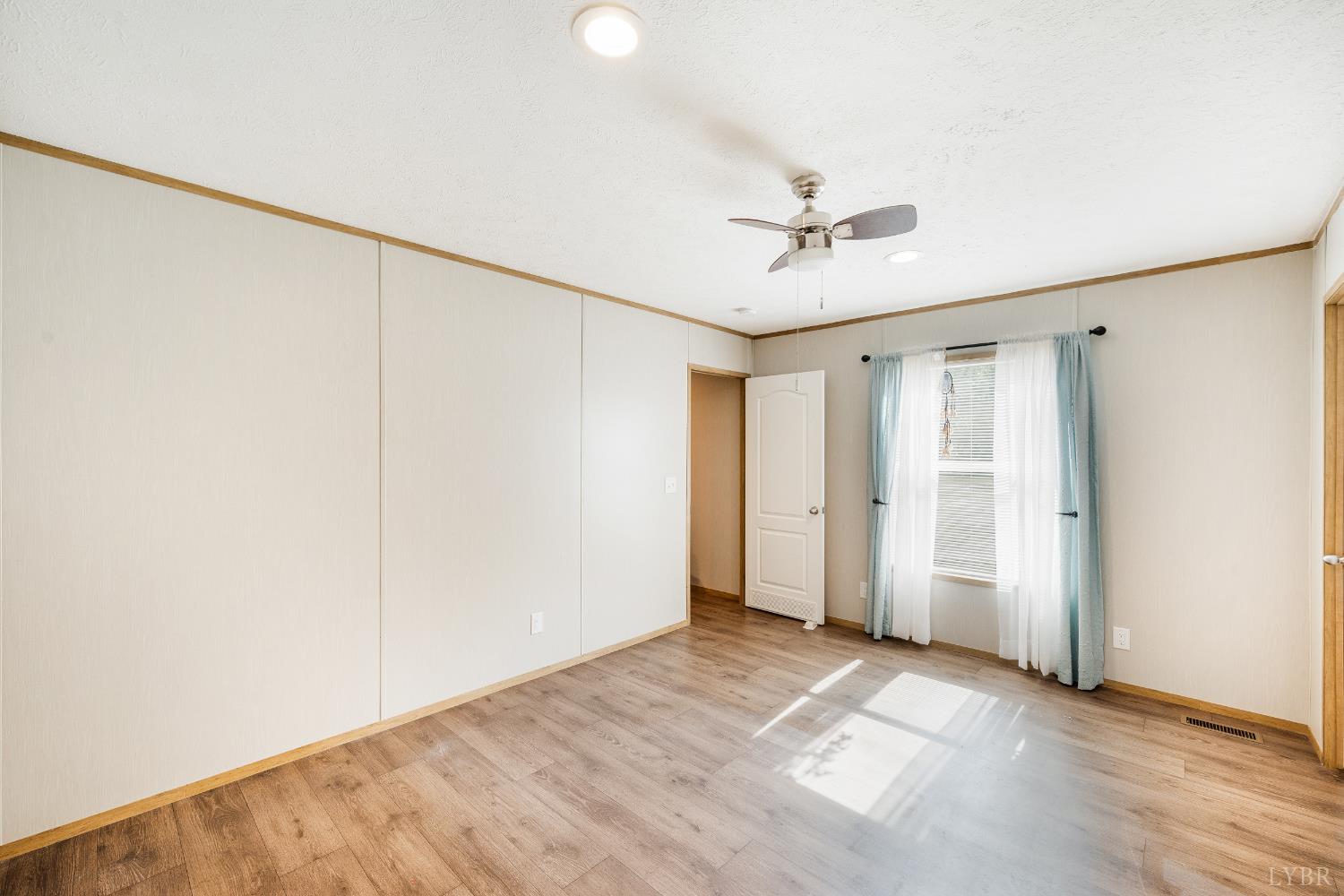 4560 Tye River Road Amherst, VA 24521 - Photo 12 of 40 a view of an empty room with a window