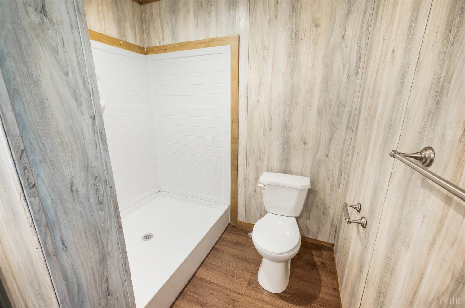 4560 Tye River Road Amherst, VA 24521 - Photo 17 of 40 a bathroom with a toilet and a shower