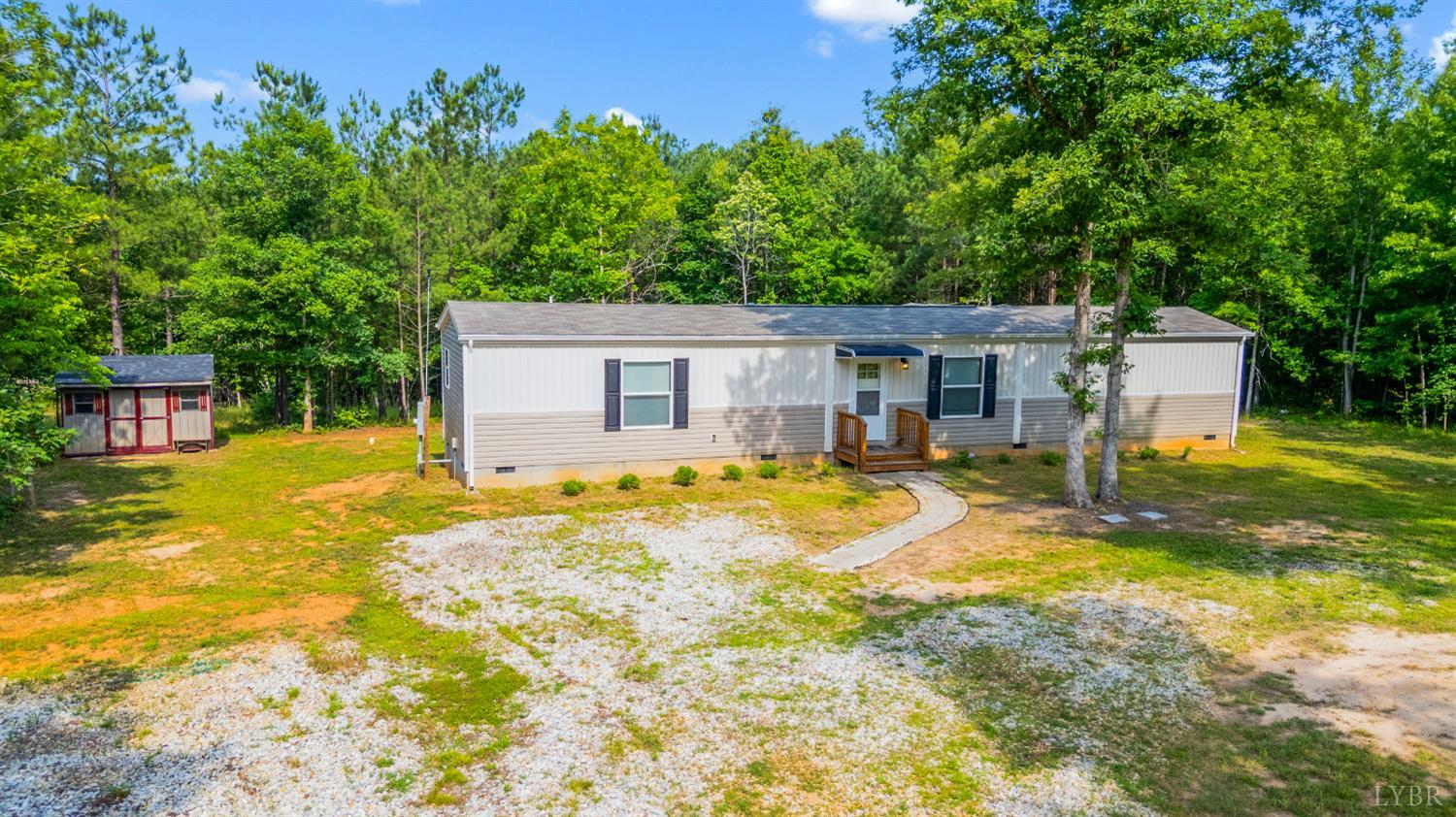 4560 Tye River Road Amherst, VA 24521 - Photo 33 of 40 a view of a house with swimming pool and sitting area