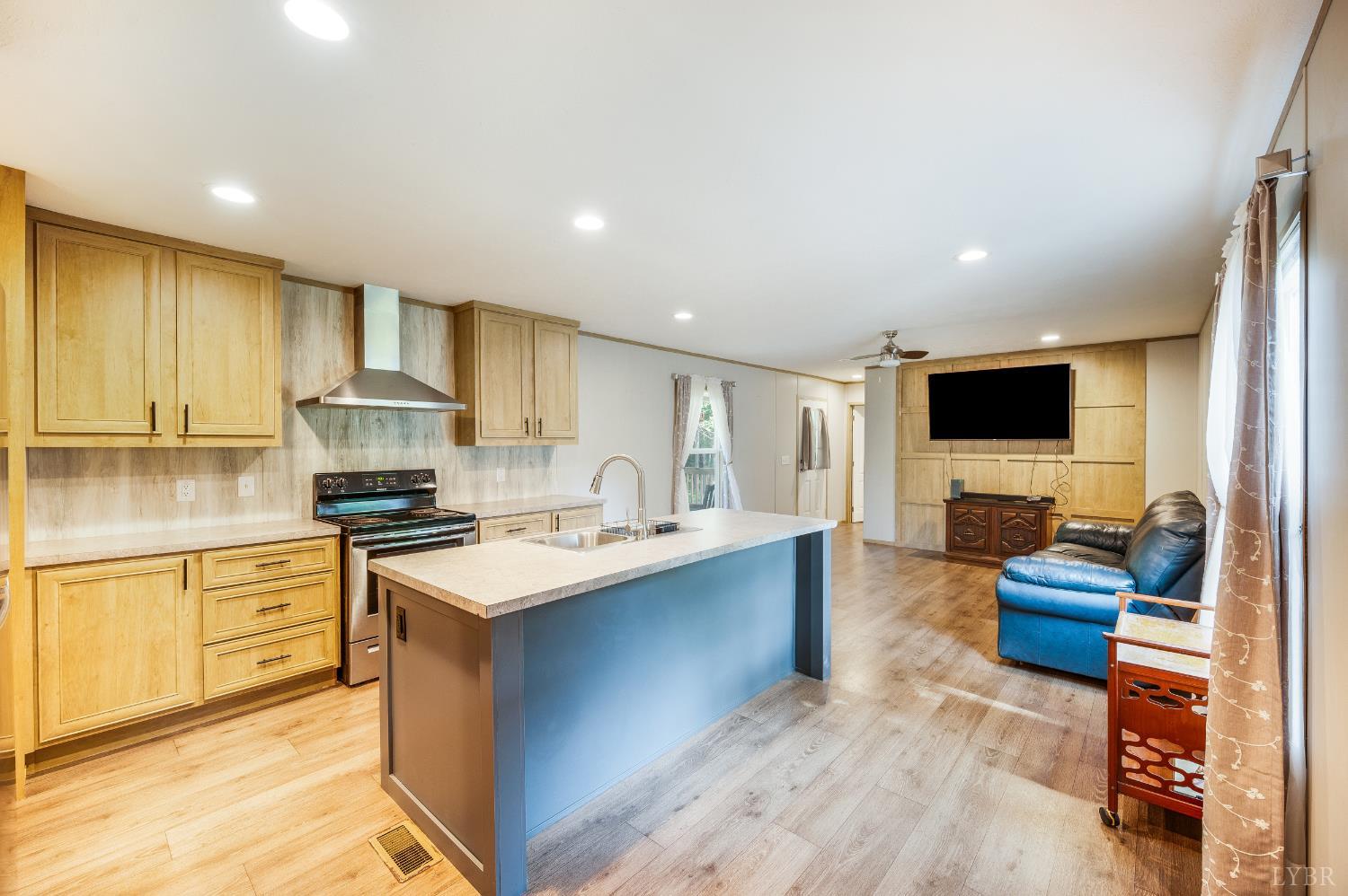 4560 Tye River Road Amherst, VA 24521 - Photo 6 of 40 a kitchen with stainless steel appliances granite countertop a sink stove and refrigerator