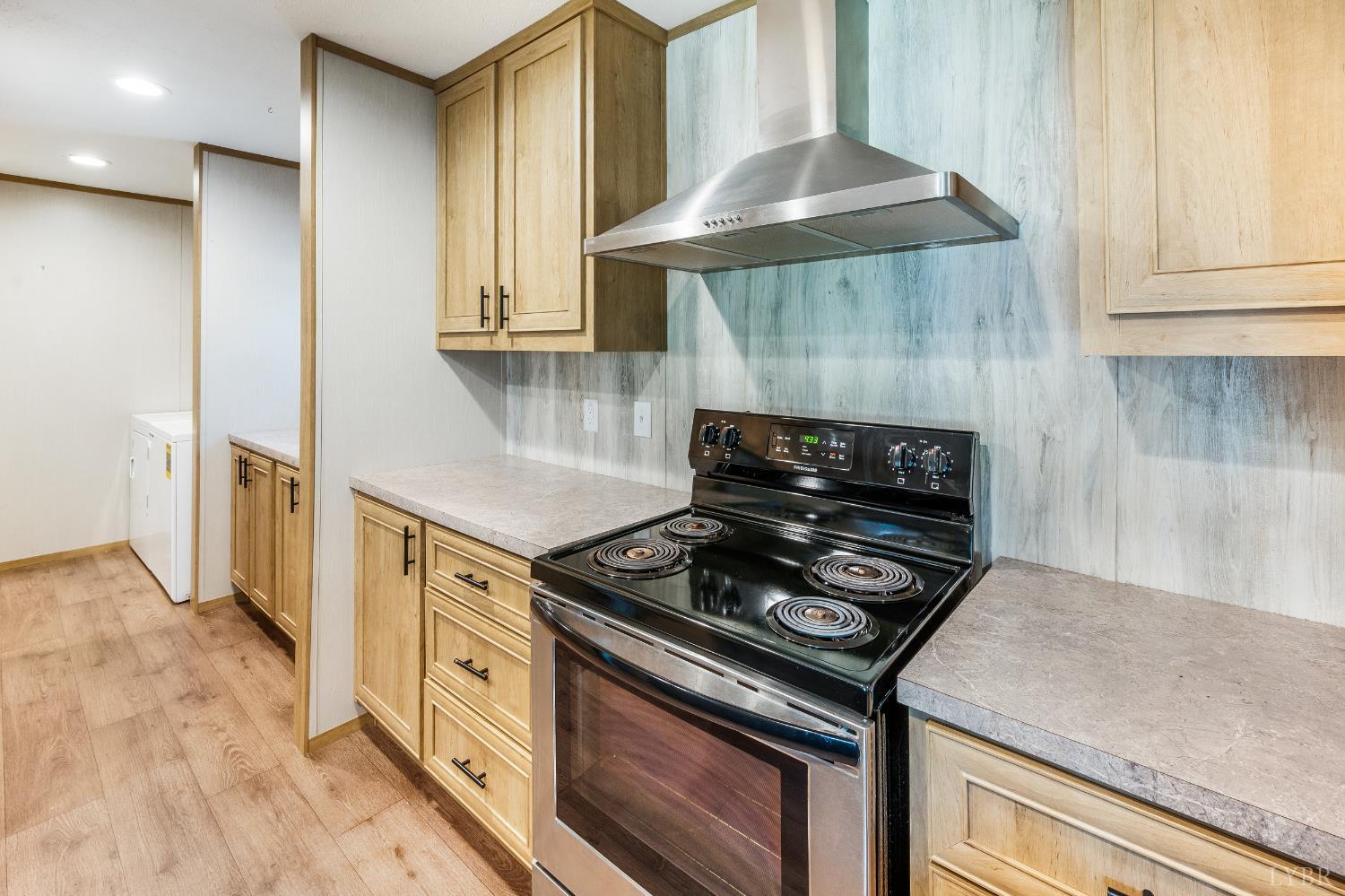 4560 Tye River Road Amherst, VA 24521 - Photo 8 of 40 a kitchen with stainless steel appliances granite countertop a stove and a refrigerator