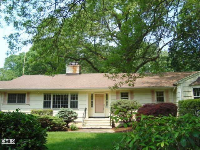 375 Booth Hill Road Trumbull, CT 06611 - Photo 1 of 1 a front view of a house with garden