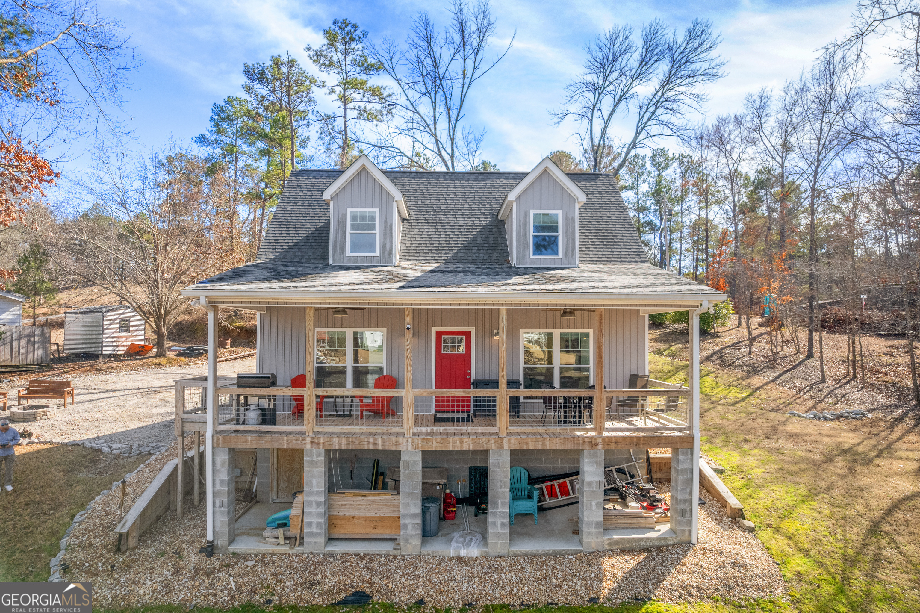 a view of a chairs and table in the patio