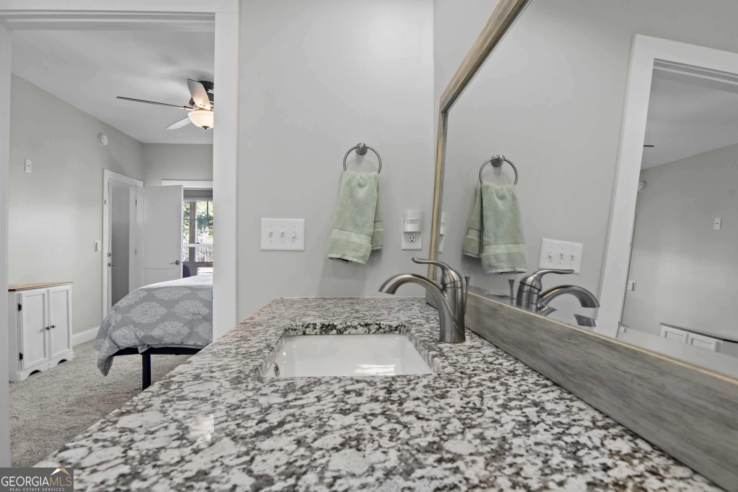 188 Sunhaven Lane Sparta, GA 31087 - Photo 30 of 63 a bathroom with a sink and a mirror