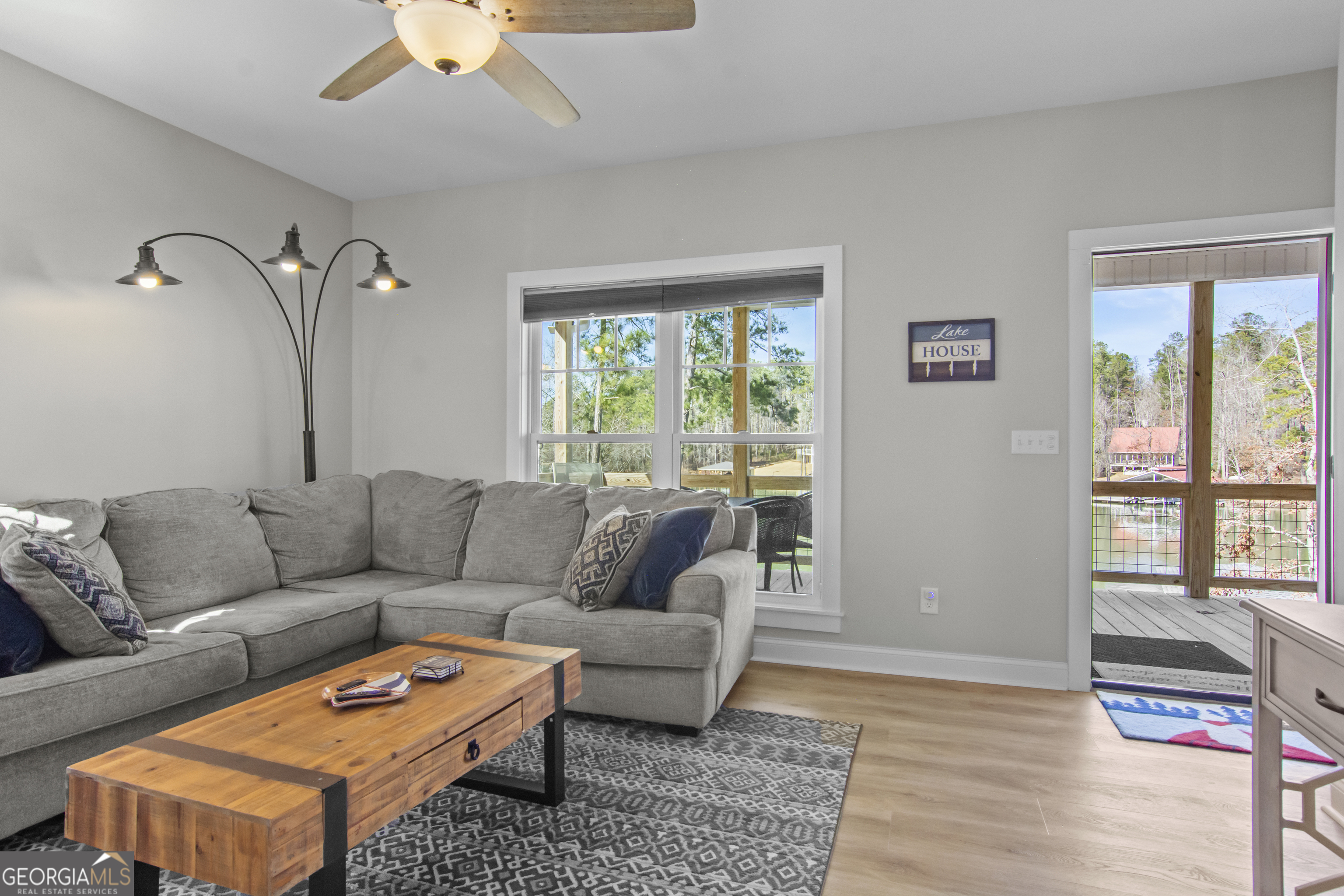 188 Sunhaven Lane Sparta, GA 31087 - Photo 38 of 63 a living room with furniture and a large window