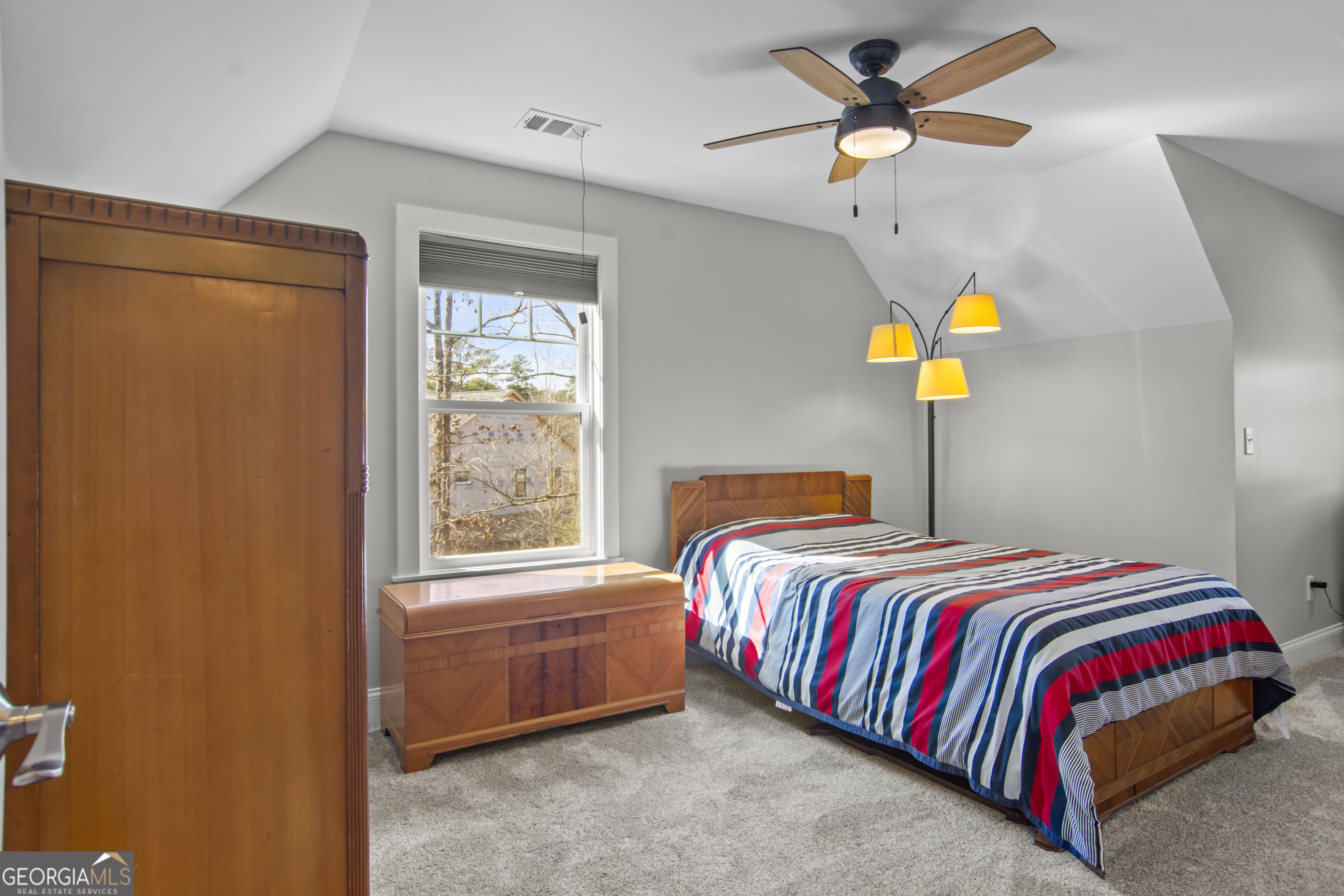 188 Sunhaven Lane Sparta, GA 31087 - Photo 48 of 63 a bedroom with a bed and window