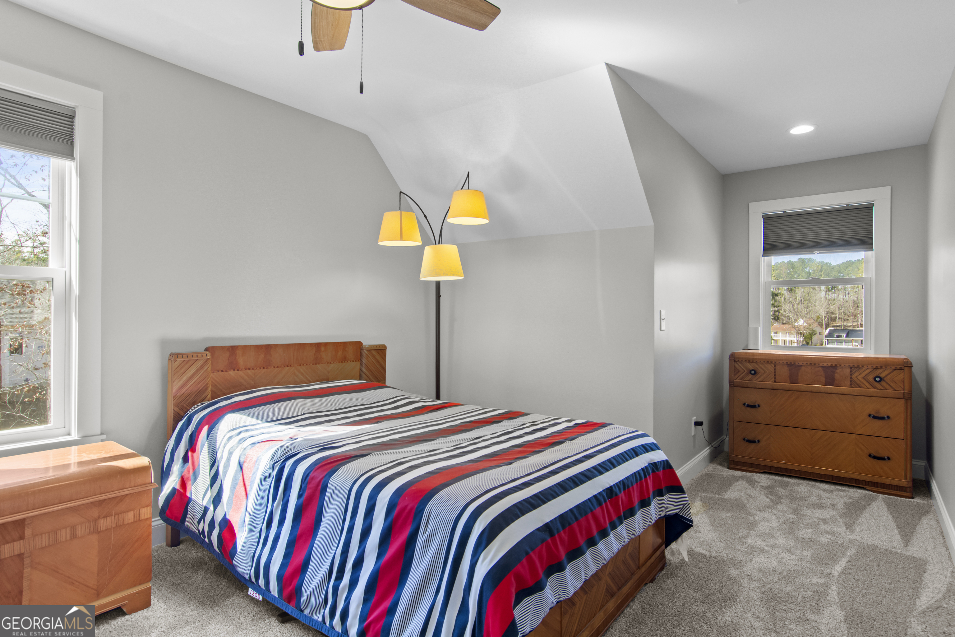 188 Sunhaven Lane Sparta, GA 31087 - Photo 51 of 63 a bedroom with a bed and a window