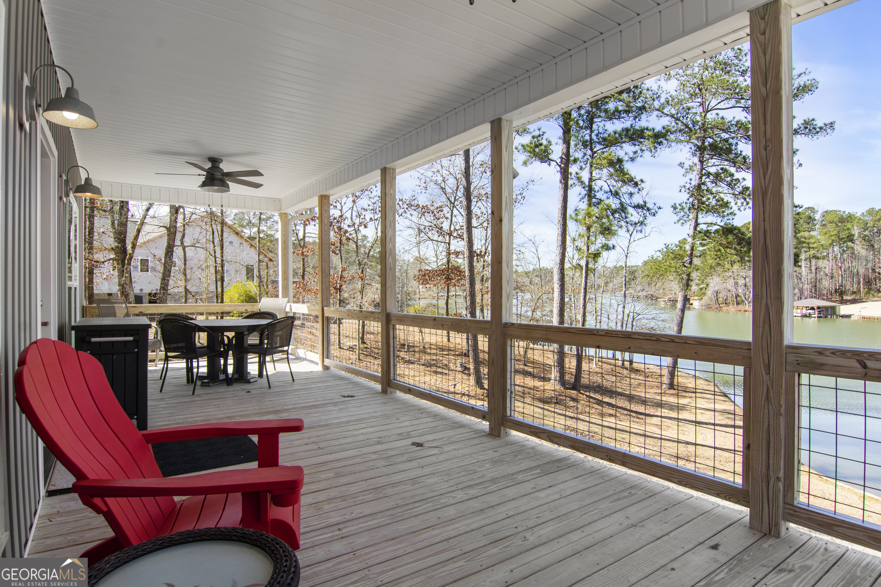 188 Sunhaven Lane Sparta, GA 31087 - Photo 56 of 63 a view of a dining room with furniture window and wooden floor