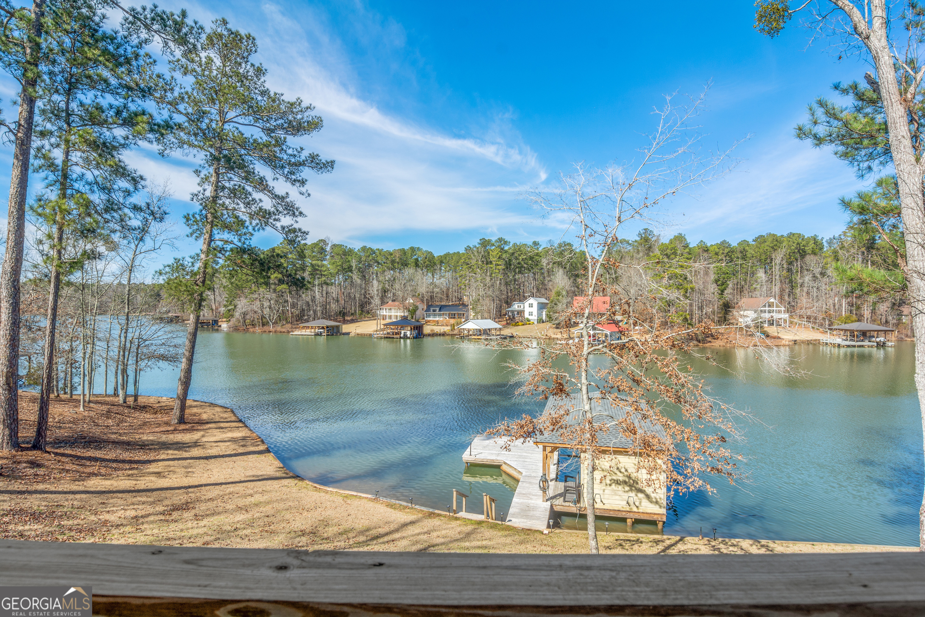 188 Sunhaven Lane Sparta, GA 31087 - Photo 57 of 63 a view of a lake with a mountain in the background