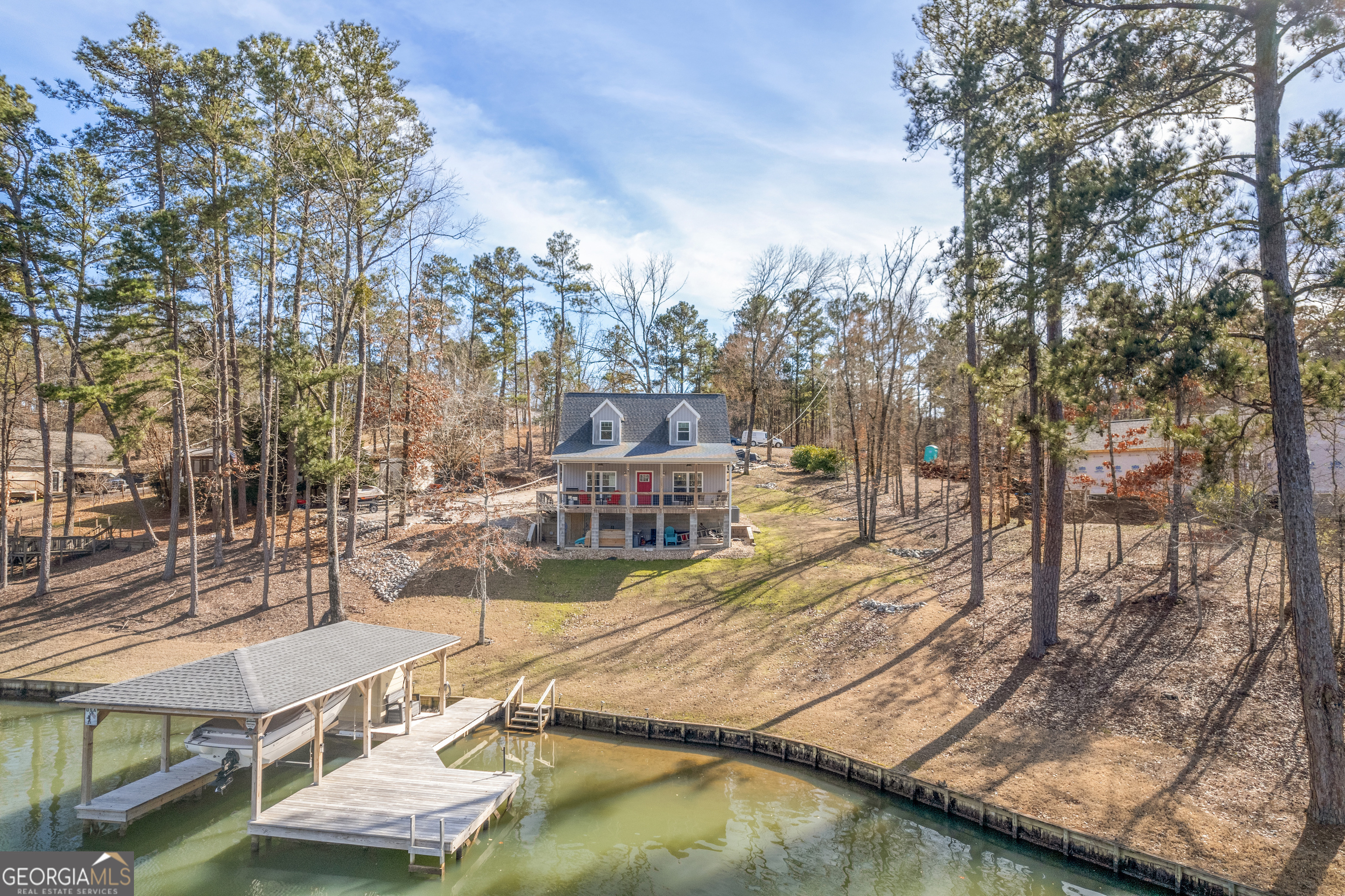 188 Sunhaven Lane Sparta, GA 31087 - Photo 62 of 63 a view of residential houses with yard and swimming pool