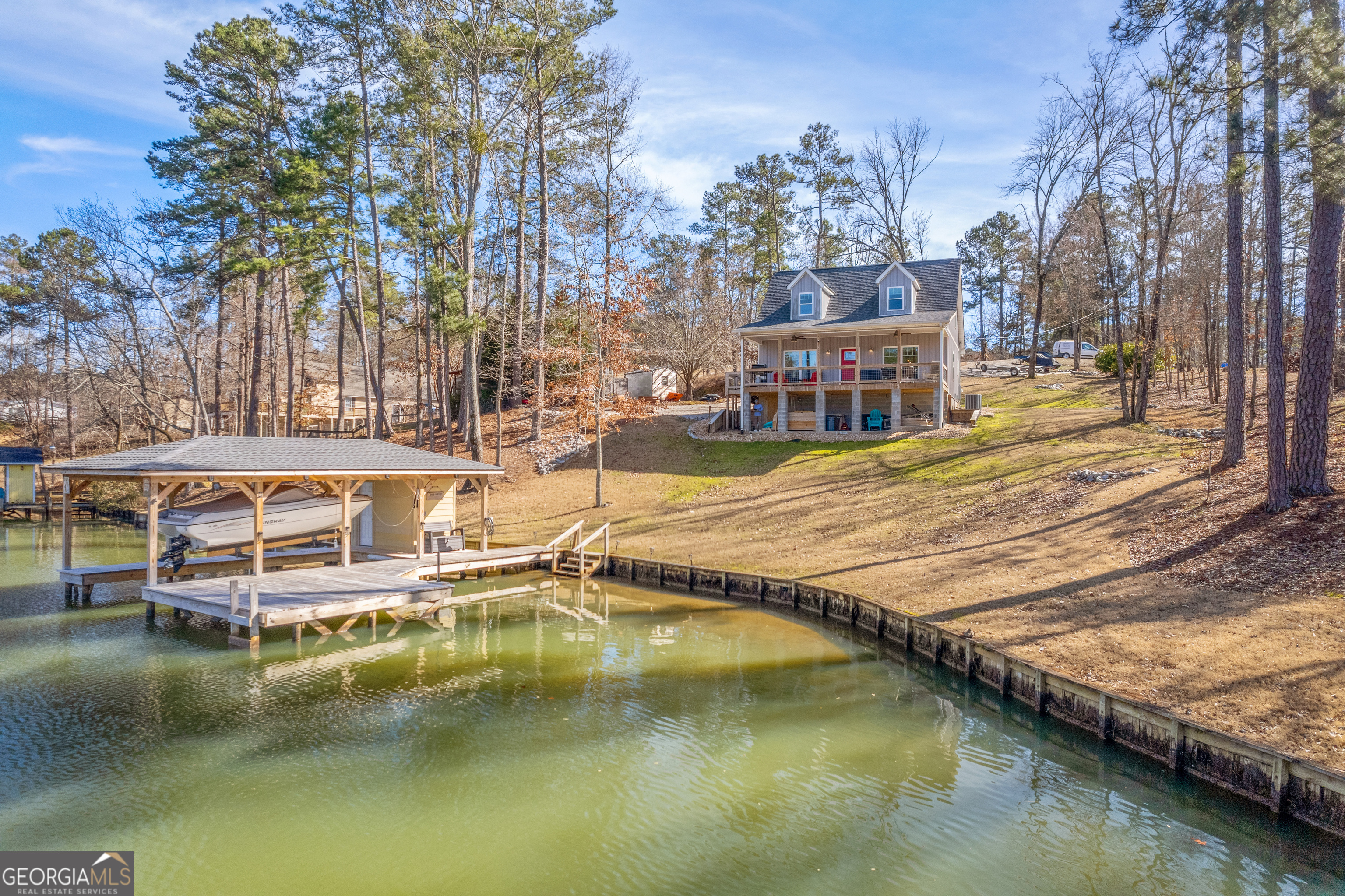 188 Sunhaven Lane Sparta, GA 31087 - Photo 10 of 63 a small pool with some trees