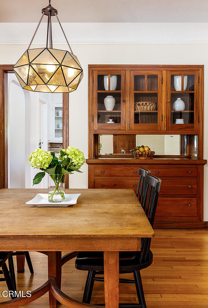 604 Douglas Street Pasadena, CA 91104 - Photo 13 of 41 a dining room with furniture and wooden floor