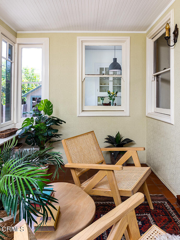 604 Douglas Street Pasadena, CA 91104 - Photo 17 of 41 a dining room with furniture and a potted plant