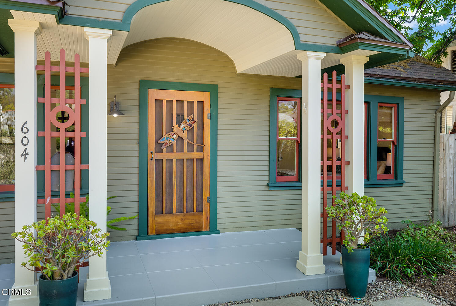 604 Douglas Street Pasadena, CA 91104 - Photo 2 of 41 a front view of a house with a garden