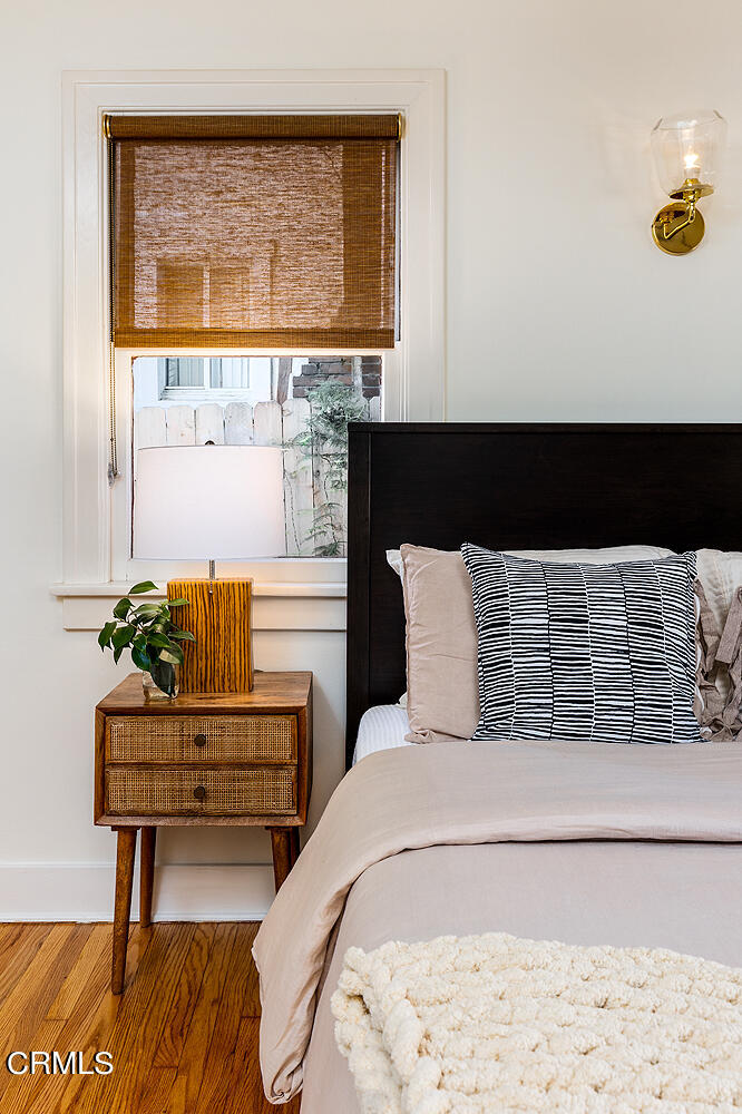 604 Douglas Street Pasadena, CA 91104 - Photo 27 of 41 a bedroom with a bed and a window