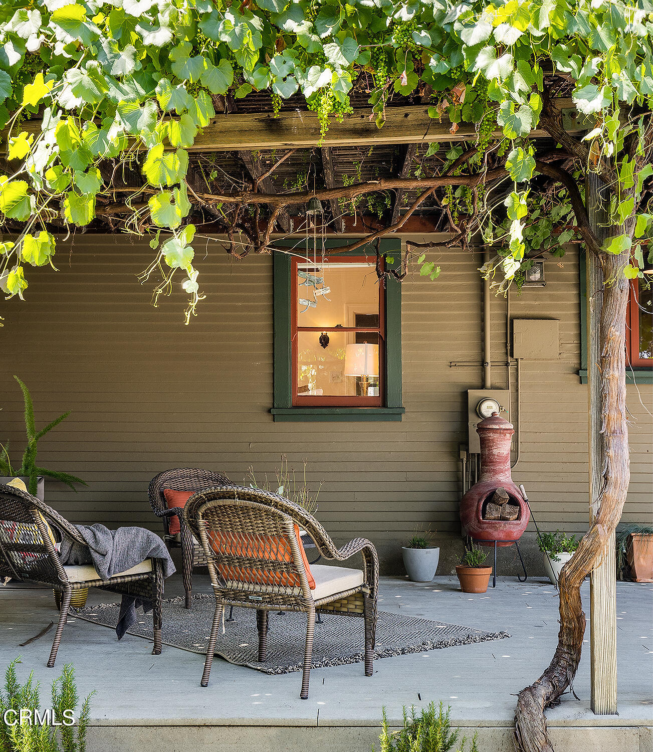 604 Douglas Street Pasadena, CA 91104 - Photo 35 of 41 a backyard of a house with table and chairs
