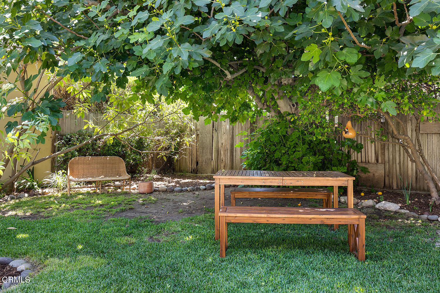 604 Douglas Street Pasadena, CA 91104 - Photo 37 of 41 a wooden bench sitting in the grass