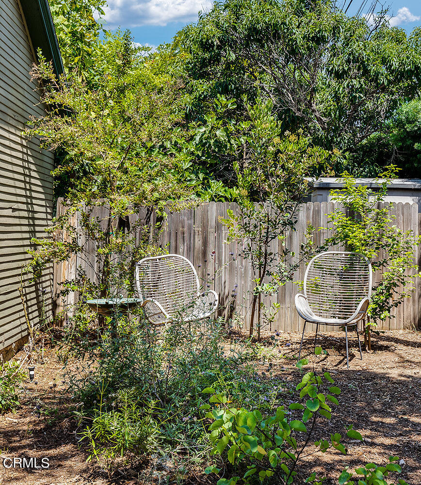 604 Douglas Street Pasadena, CA 91104 - Photo 38 of 41 a backyard of a house with table and chairs