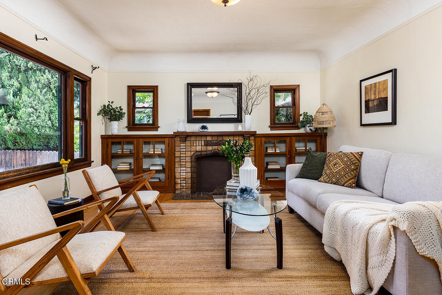 604 Douglas Street Pasadena, CA 91104 - Photo 7 of 41 a living room with furniture a large window and wooden floor