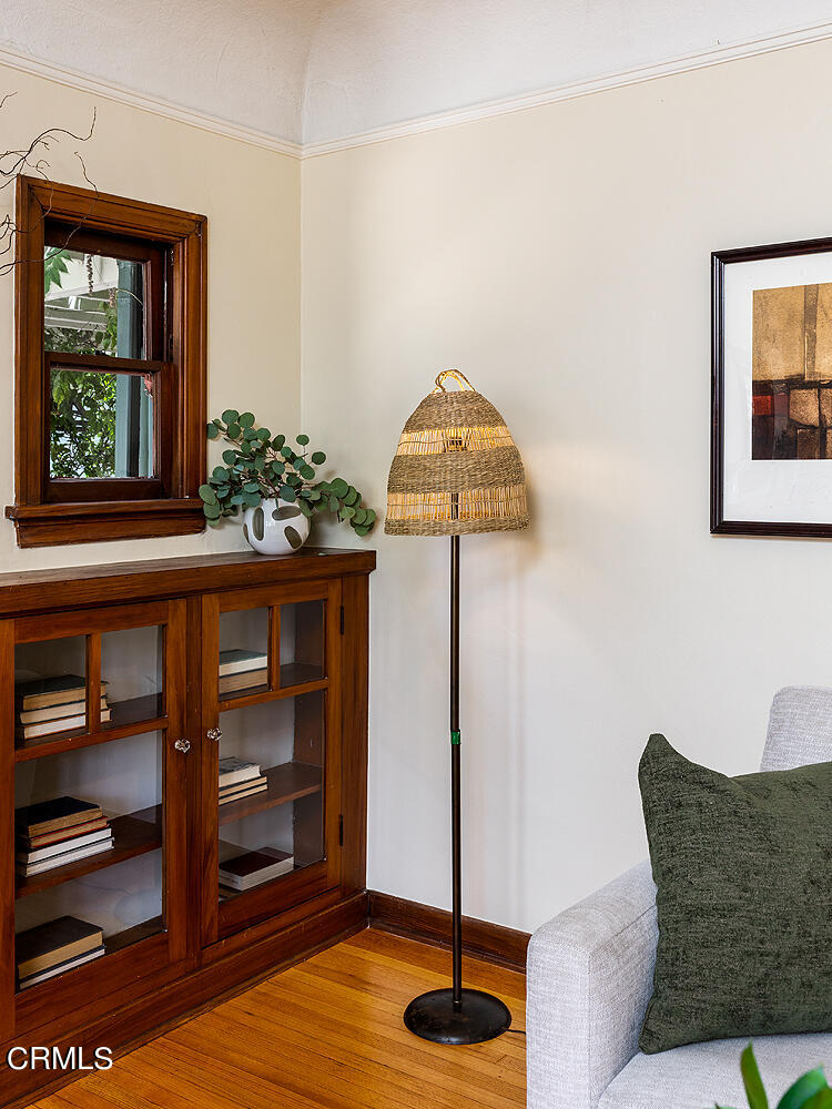 604 Douglas Street Pasadena, CA 91104 - Photo 9 of 41 a living room with furniture a window and a potted plant