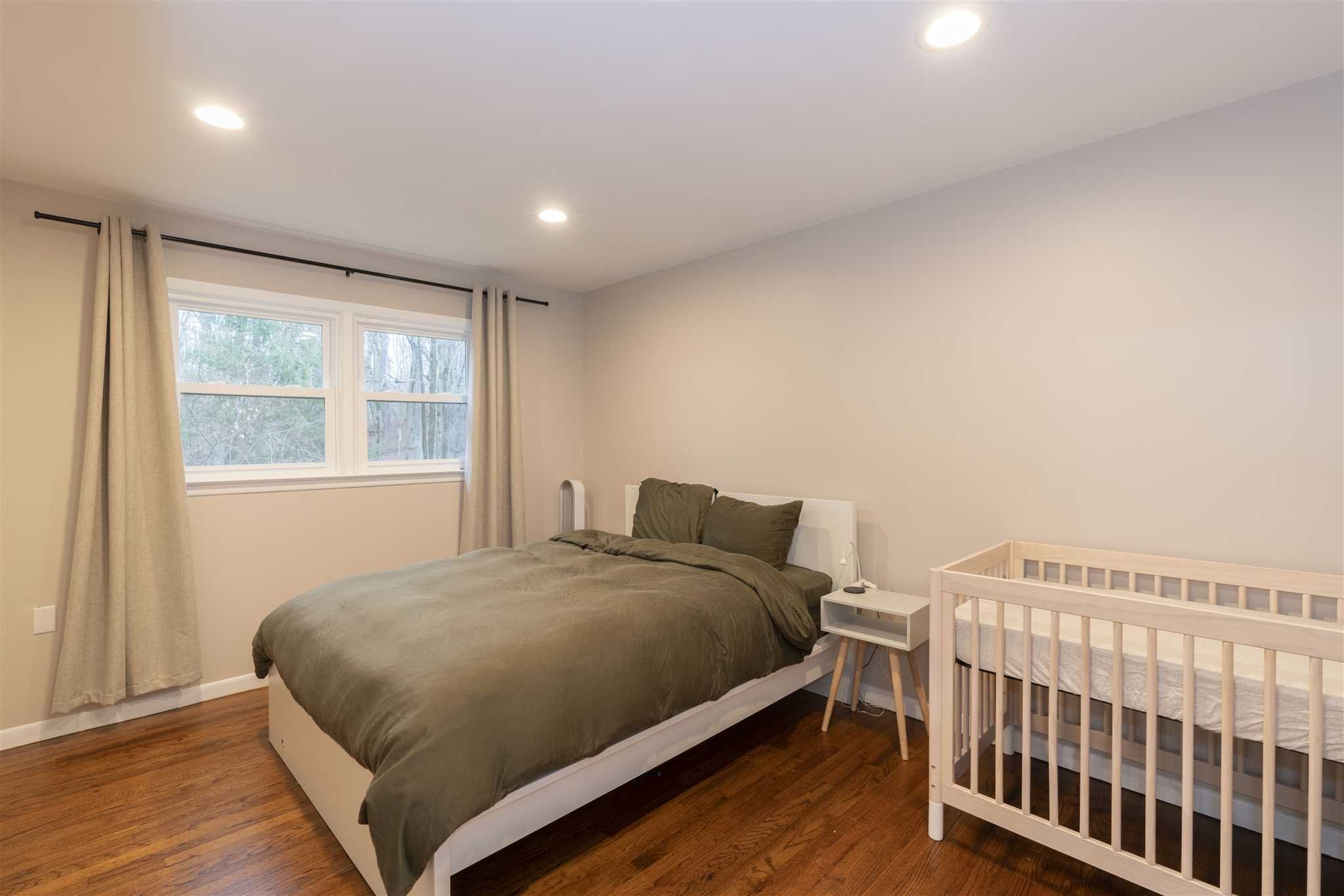 13 Slate Hill Drive Poughkeepsie, NY 12603 - Photo 11 of 30 a bedroom with a bed and a window