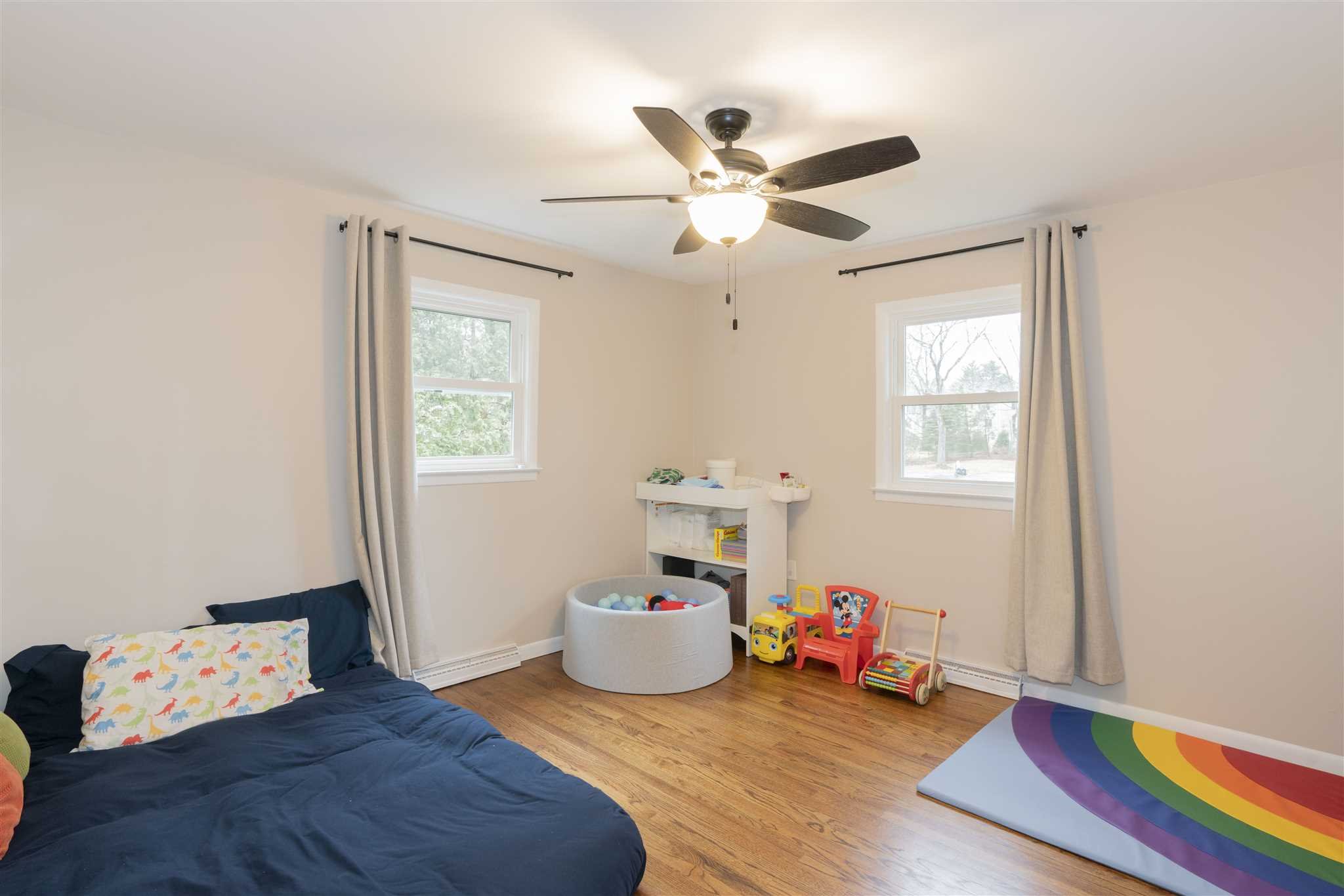 13 Slate Hill Drive Poughkeepsie, NY 12603 - Photo 17 of 30 a bedroom with furniture and a window