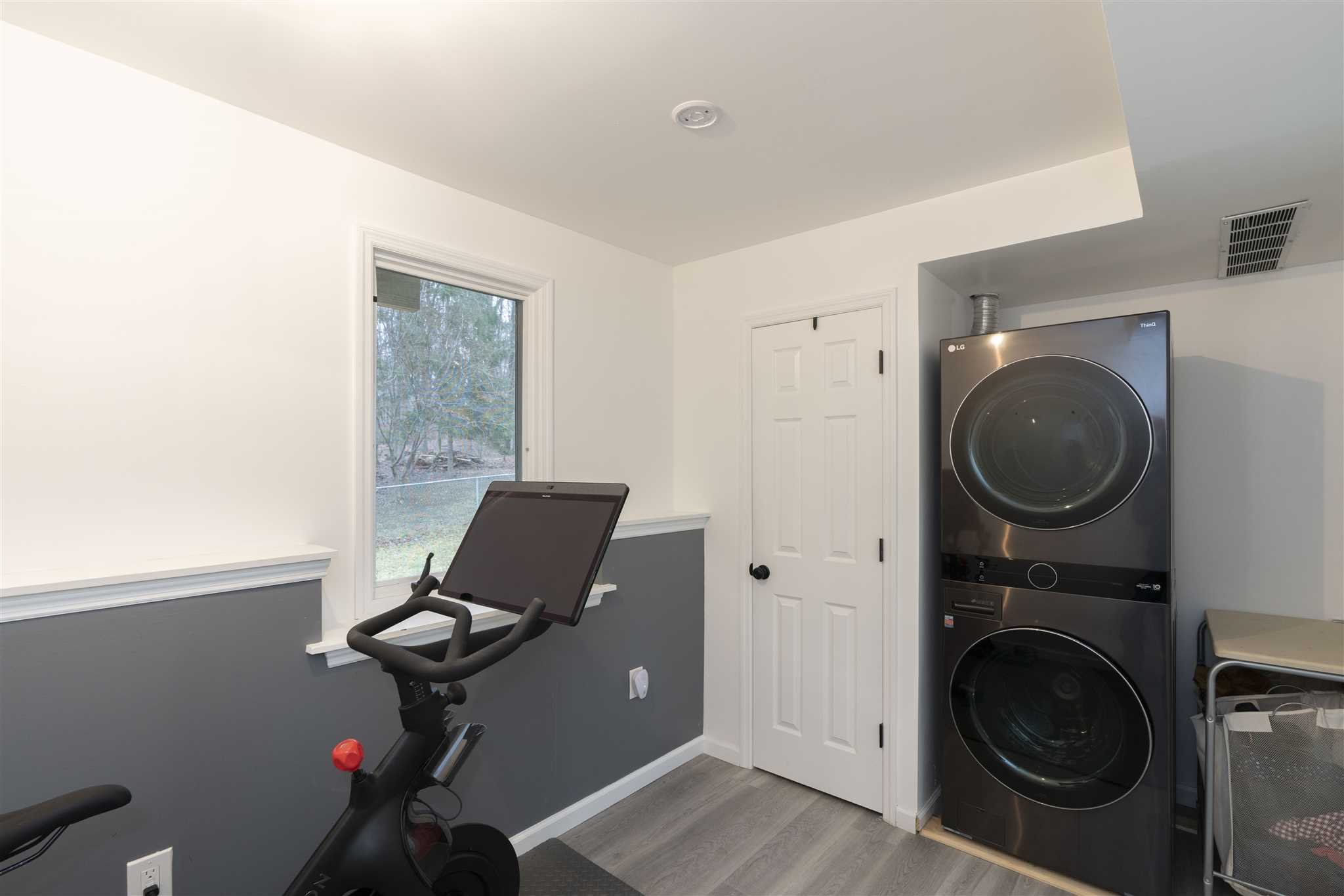 13 Slate Hill Drive Poughkeepsie, NY 12603 - Photo 20 of 30 a view of a livingroom with washer and dryer