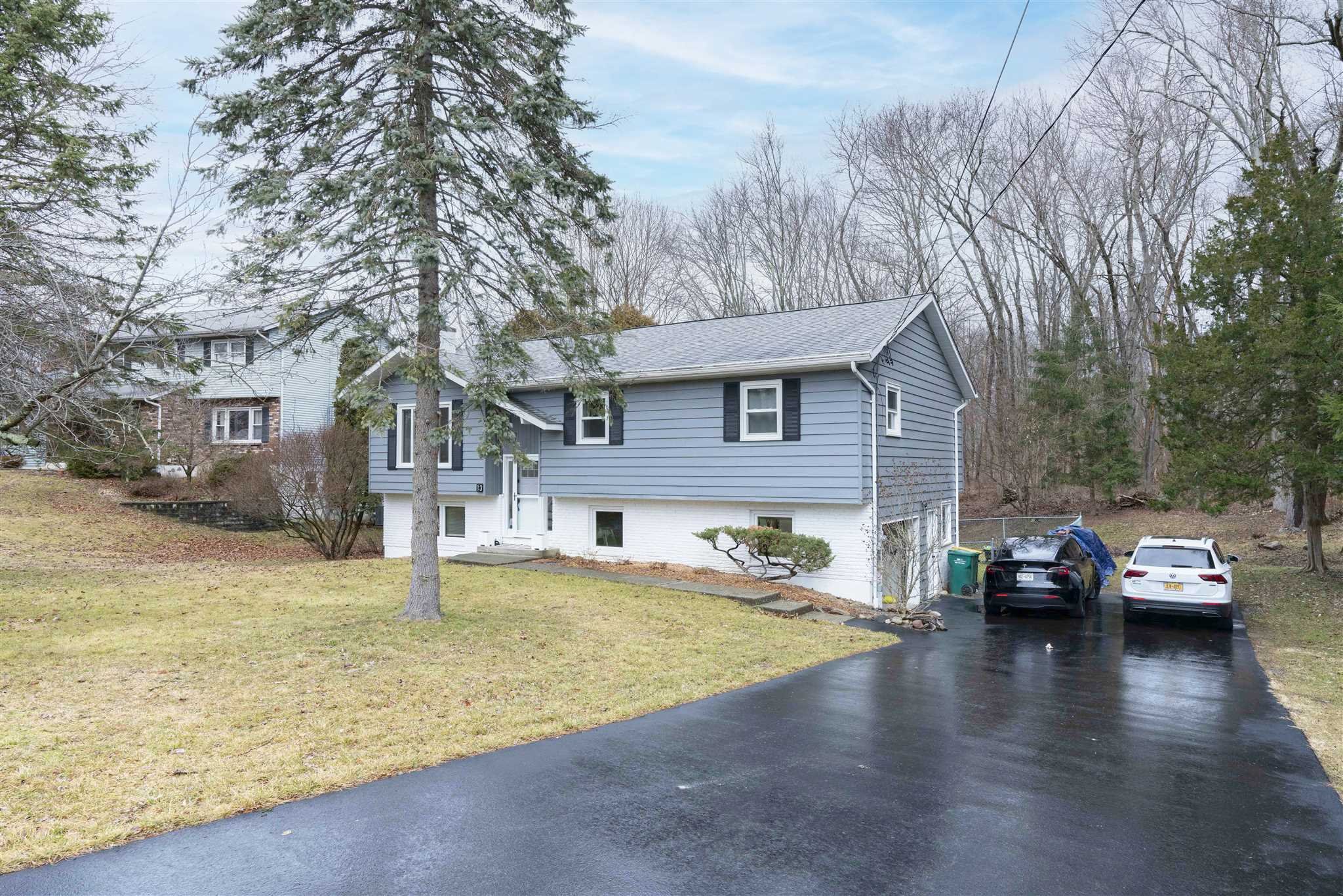 13 Slate Hill Drive Poughkeepsie, NY 12603 - Photo 28 of 30 a view of a house with a patio