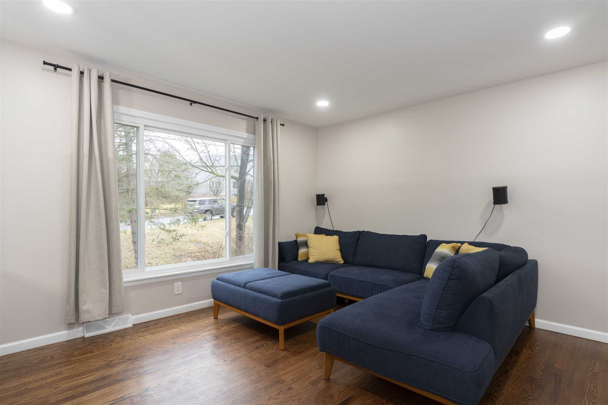 13 Slate Hill Drive Poughkeepsie, NY 12603 - Photo 4 of 30 a living room with furniture and a window