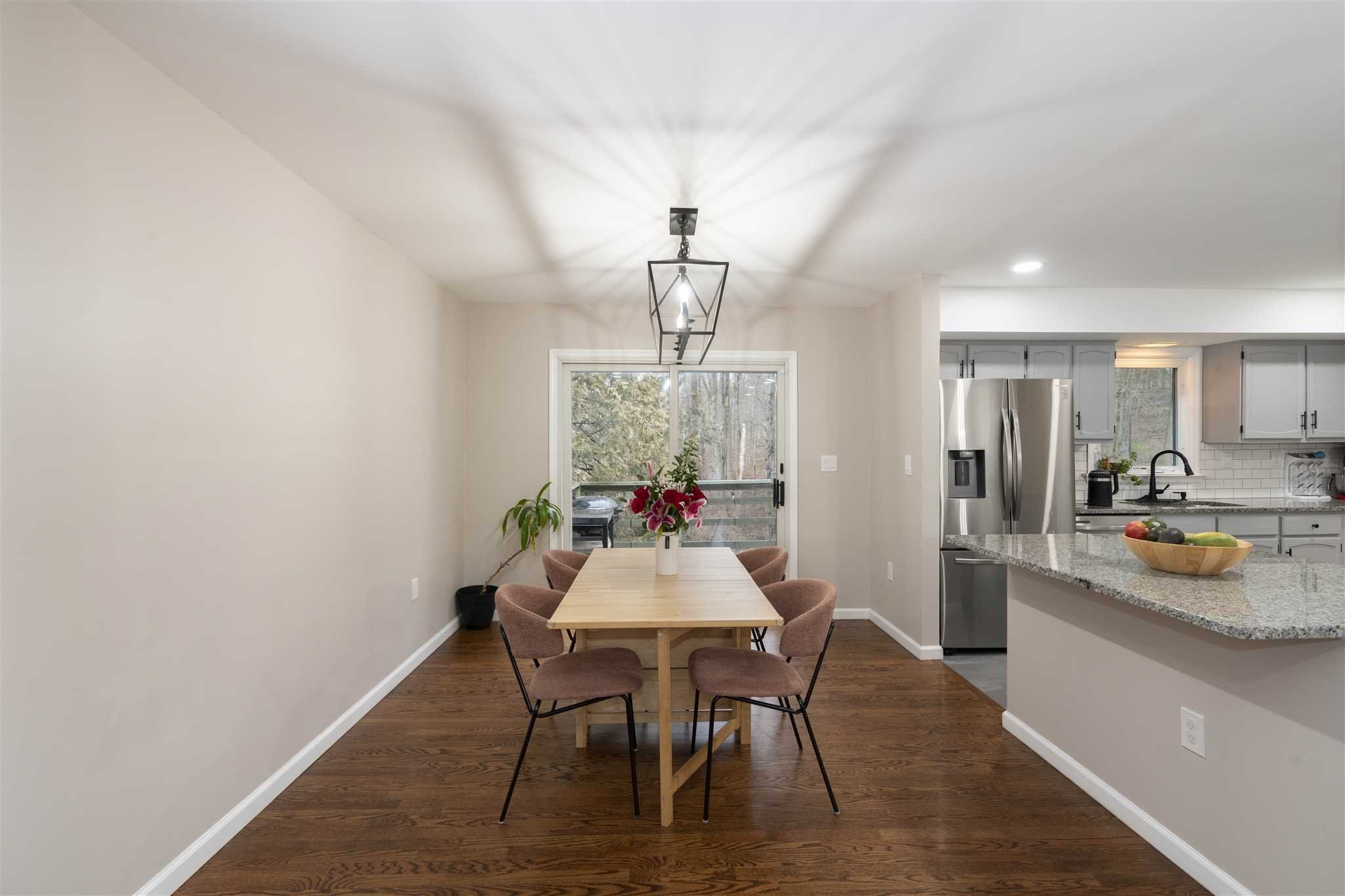 13 Slate Hill Drive Poughkeepsie, NY 12603 - Photo 8 of 30 a view of a dining room with furniture and window