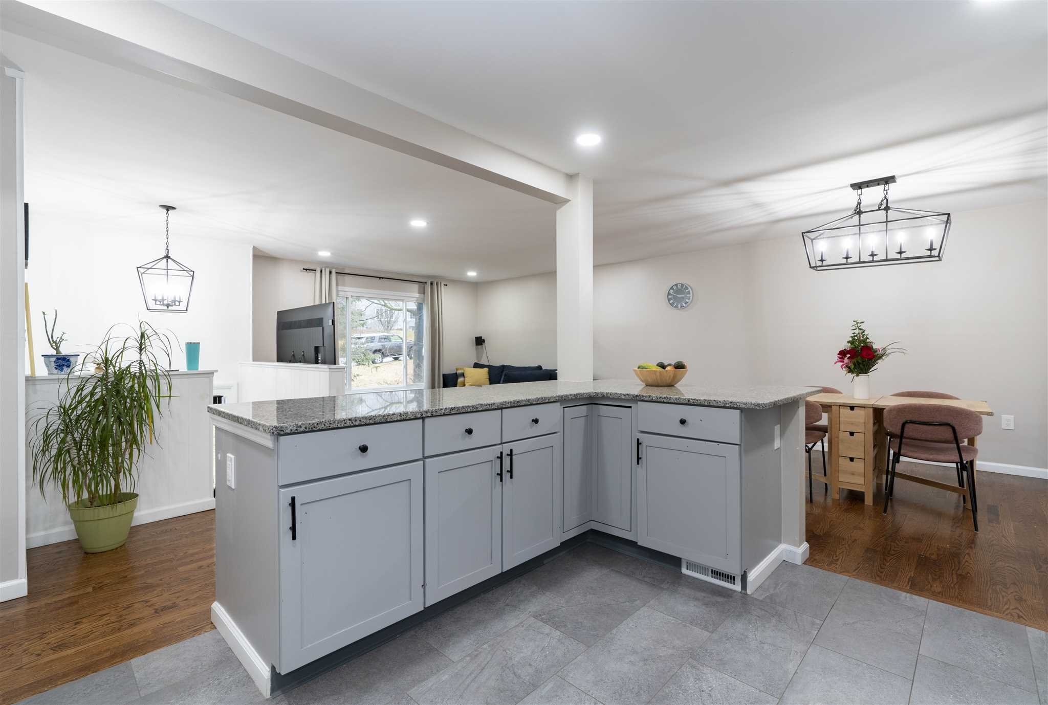 13 Slate Hill Drive Poughkeepsie, NY 12603 - Photo 10 of 30 a open hall with cabinets a counter and chairs