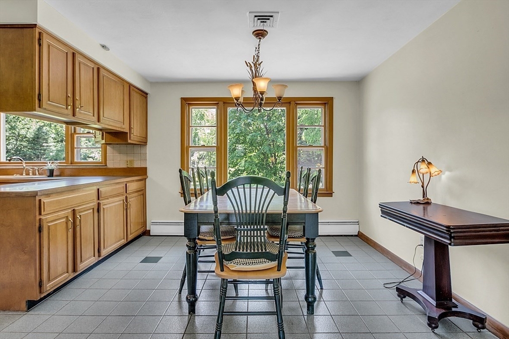233 West Acton Road Stow, MA 01775 - Photo 14 of 41 a dining room with furniture and window